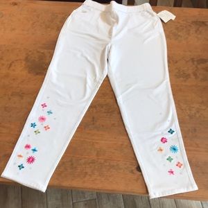 Dream Jeans size L 30 length, 34 waist, rhinestone on front legs, 96% cotton.